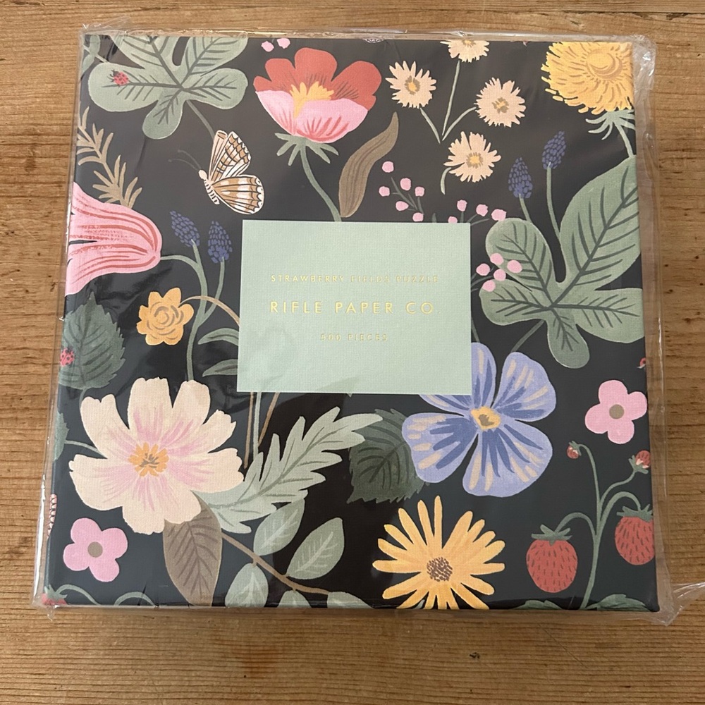 Brand newRIFLE Paper Co Strawberry Fields Jigsaw Puzzle in original packaging.